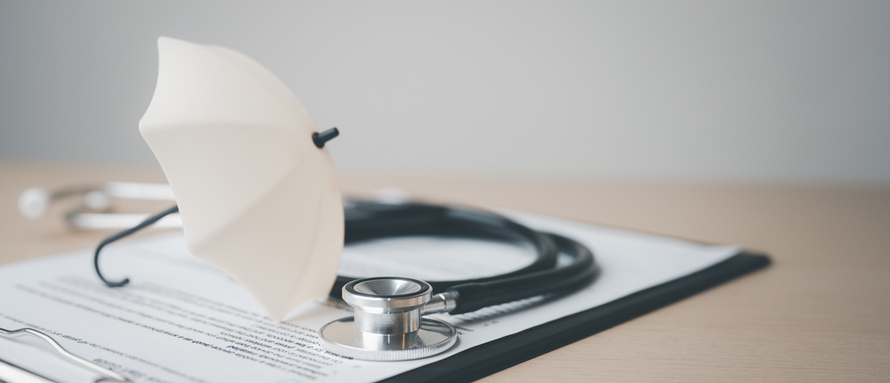 Health,,Insurance,,Medical,,Policy,,Coverage,,Hospital,,A,Stethoscope,And,A