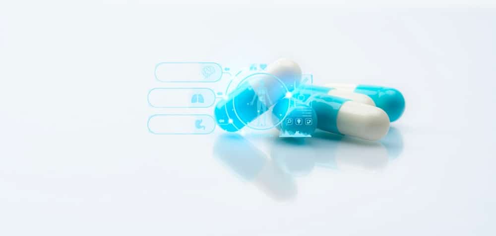 Blue,and,white,capsule,pills,with,pharmacokinetics,concept.,diagnostic,medical