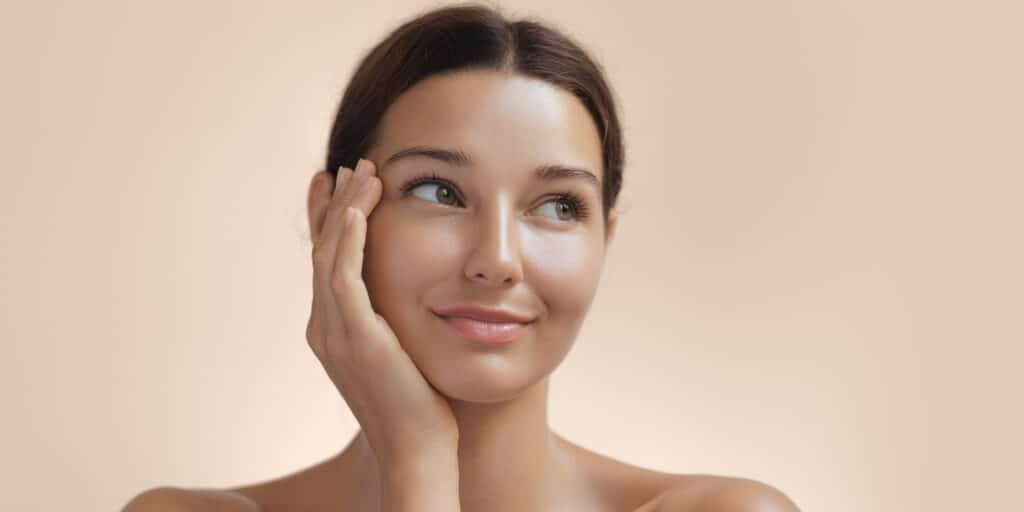 Woman smiling with clear skin from a chemical peel in Sandy, UT Woman smiling with clear skin from a chemical peel in Sandy, UT